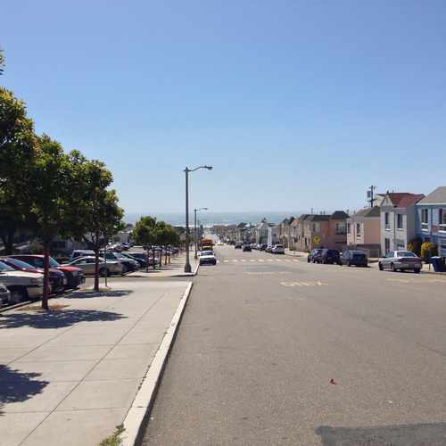 photo of Ocean View with a Row of Pastel Houses at 1873 37th Avenue San Francisco CA 94122